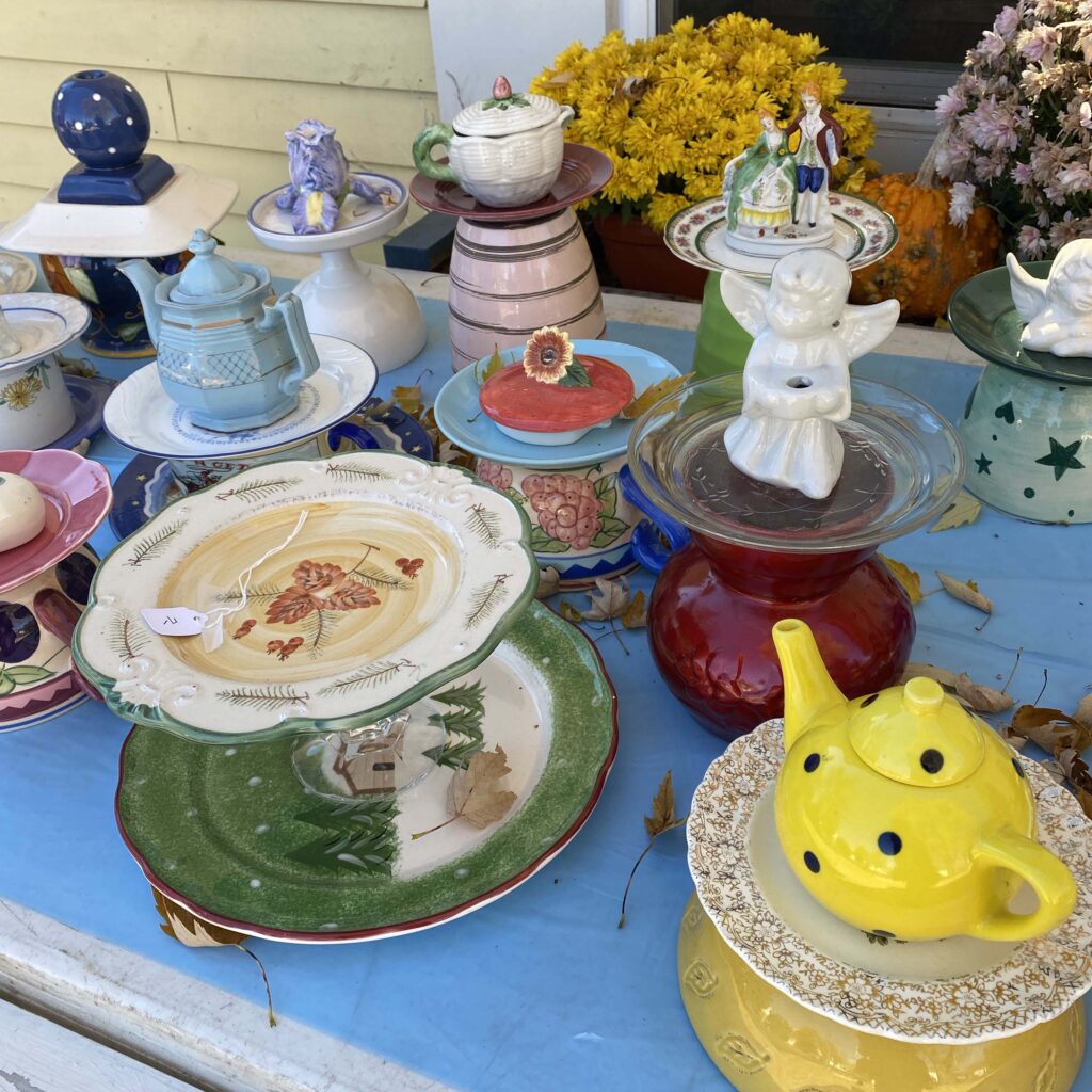Stacked plate and tea cup art.