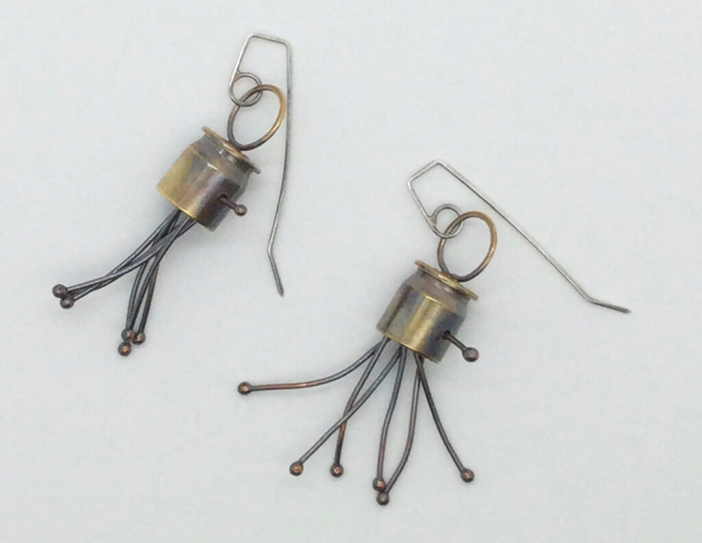 Dangly earrings by Jo Sheilds.